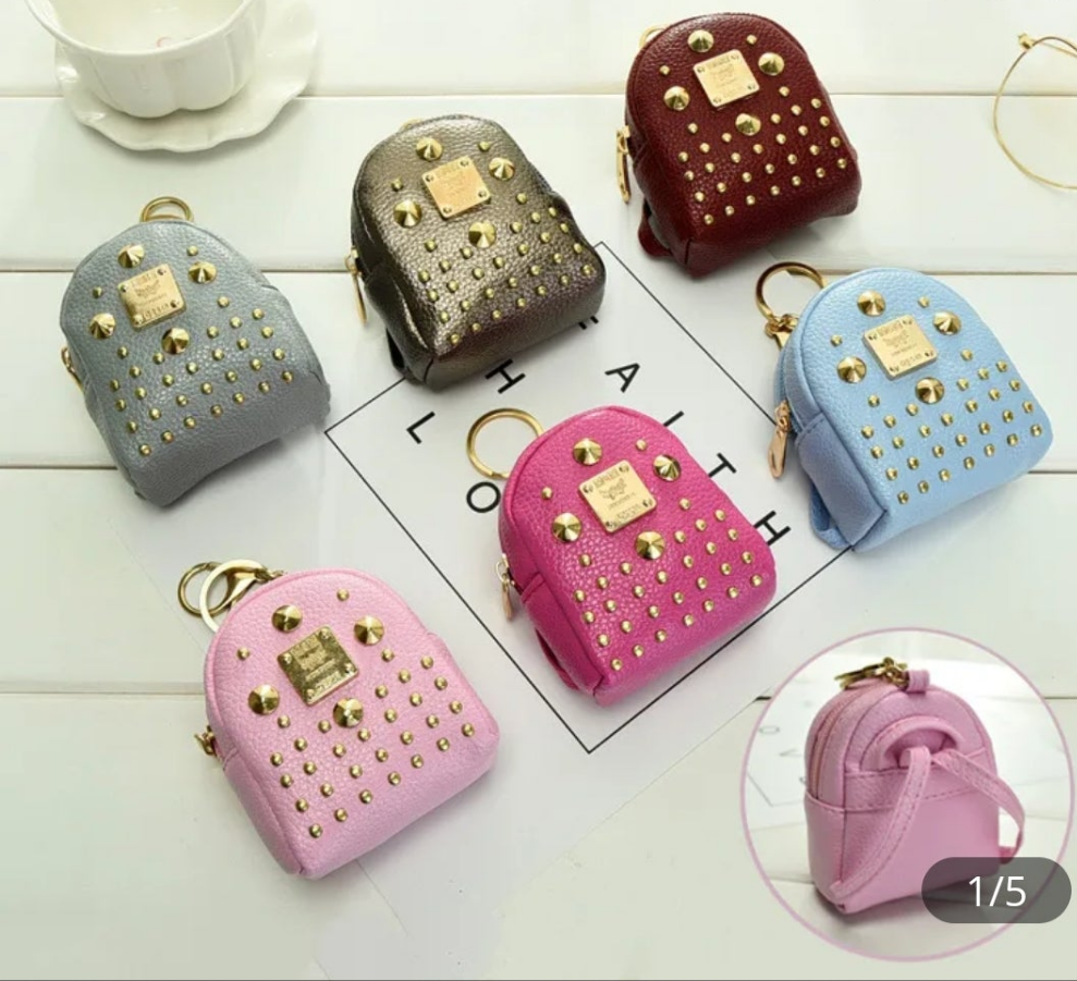 Gray coin backpack keychain