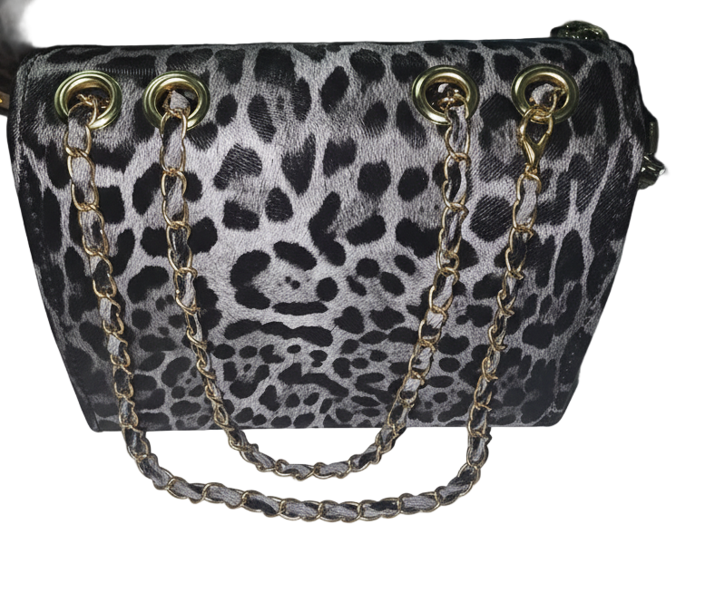 Check out these sexy cheetah and leopard purses PU.Leather purses