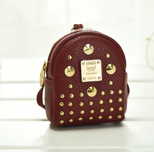 Red coin backpack keychain