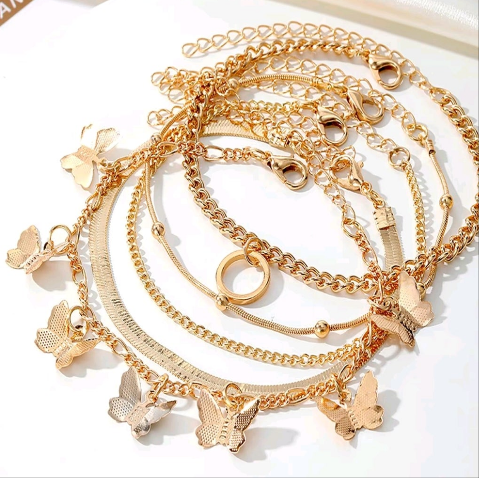 Butterfly charm bracelet five piece set can be worn on ankle as well.