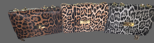 Check out these sexy cheetah and leopard purses PU.Leather purses