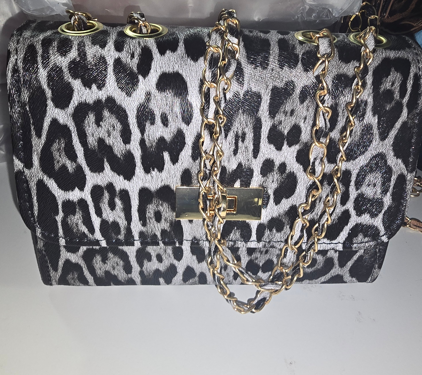 Check out these sexy cheetah and leopard purses PU.Leather purses
