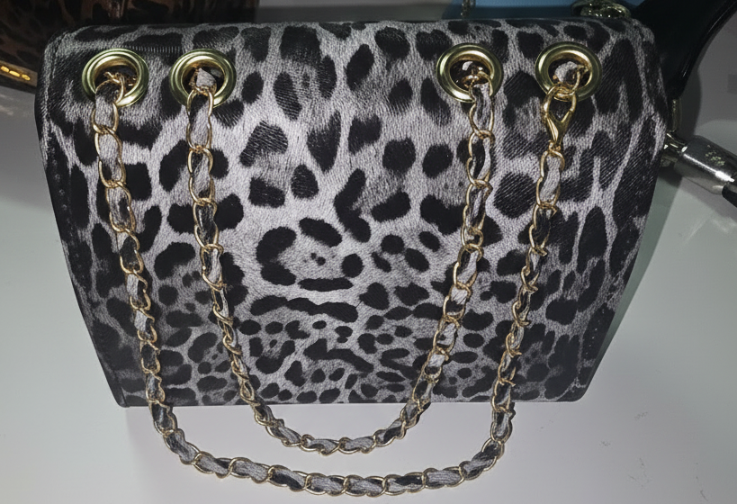 Check out these sexy cheetah and leopard purses PU.Leather purses